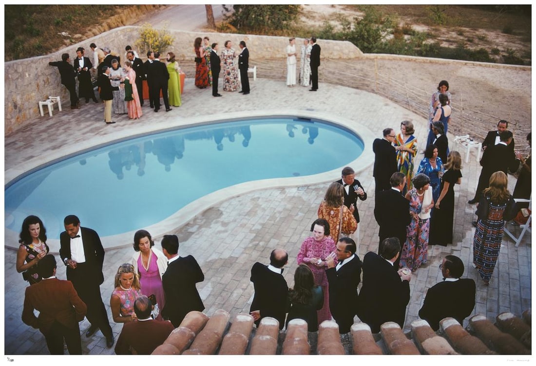 Black Tie Poolside 1973 - Slim Aarons Estate Edition: 1973(printed later): Title: Black Tie Poolside 1973 - Slim Aarons Estate Edition: 1973(printed later) Description: Black Tie Poolside 1973 - Slim Aarons Estate Edition A formal party by a swimming pool in the Algarve,
