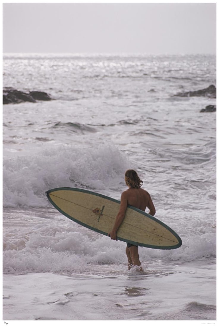 Laguna Beach Surfers 1970 - Slim Aarons Estate Stamped: 1970 (printed later): Title: Laguna Beach Surfers 1970 - Slim Aarons Estate Stamped: 1970 (printed later) Description: Laguna Beach Surfers 1970 - Slim Aarons Estate Stamped A surfer in the sea at Laguna Beach,