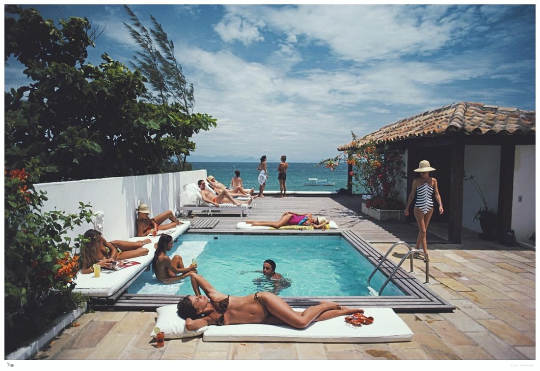 Buzios 1983 - Slim Aarons Estate Stamped: 1983 (printed later): Title: Buzios 1983 - Slim Aarons Estate Stamped: 1983 (printed later) Description: Buzios 1983 - Slim Aarons Estate Stamped Holidaymakers in Armacao dos Buzios, Brazil, January 1983 30 x 40" inches /