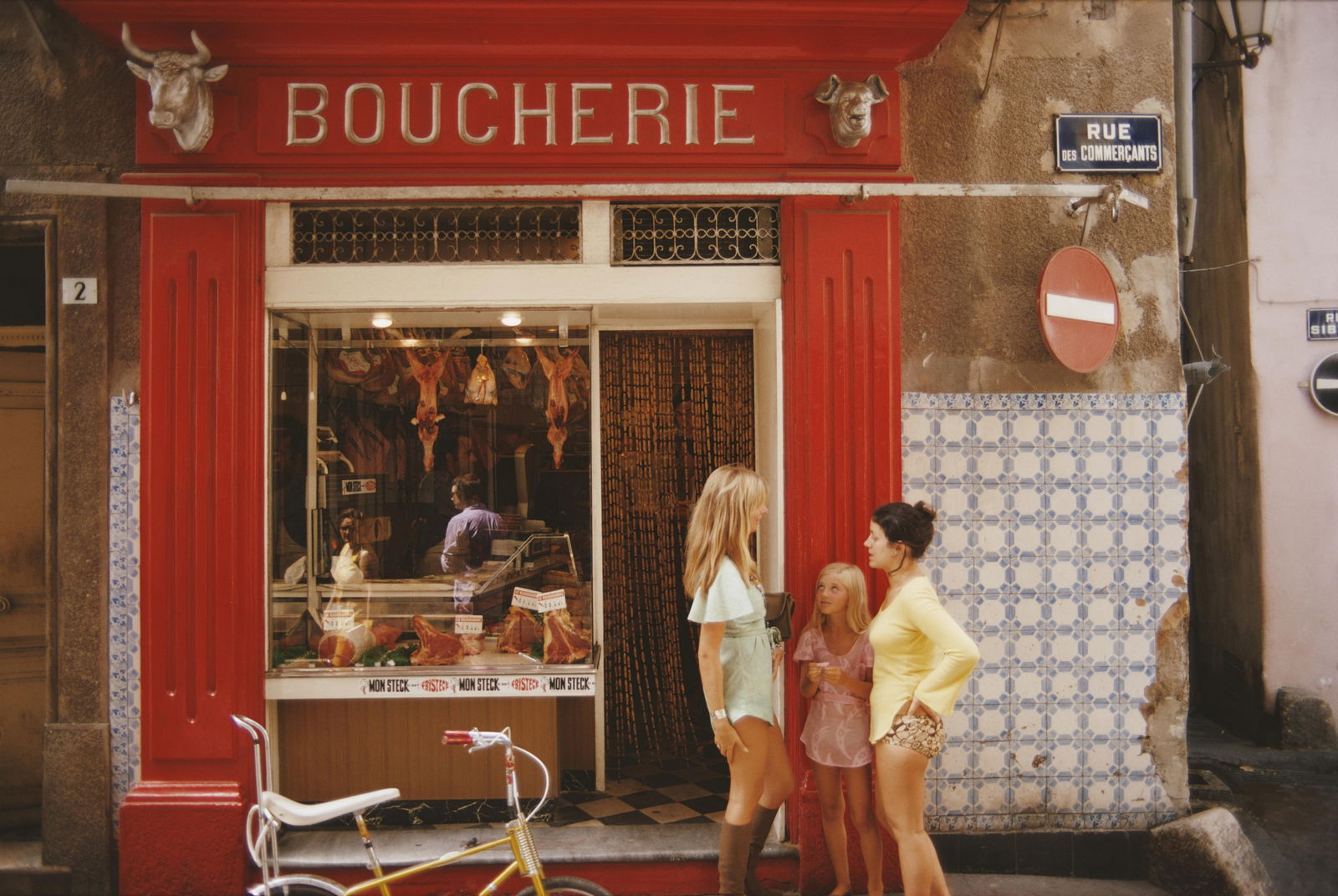 Slim Aarons 'Saint-Tropez Boucherie' 1971 Official Limited Estate Edition: 1971 (printed later): Title: Slim Aarons 'Saint-Tropez Boucherie' 1971 Official Limited Estate Edition: 1971 (printed later) Description: Saint-Tropez Boucherie' A boucherie or butcher’s shop on Rue des Commercants