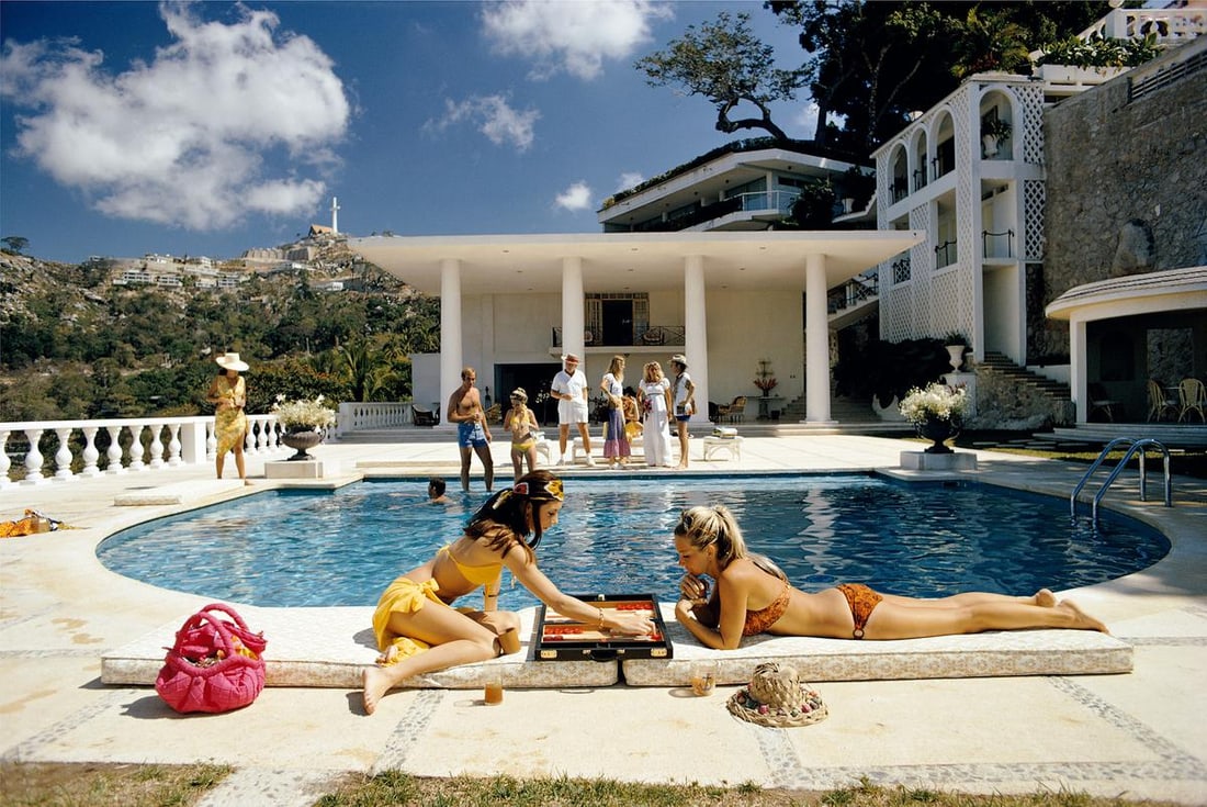 Slim Aarons 'Poolside Backgammon' 1972 Official Limited Estate Edition: Title: Slim Aarons 'Poolside Backgammon' 1972 Official Limited Estate Edition Description: Poolside Backgammon' Guests at the Villa Nirvana, owned by Oscar Obregon, in Las Brisas, Acapulco, Mexico, 19