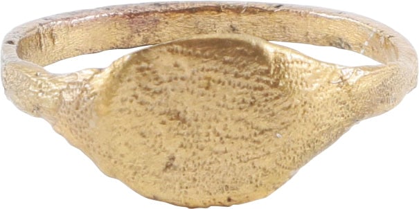 ROMAN MAN’S RING, 2nd-5th CENTURY AD, SIZE 8 ¾: Size 8 ¾. Gilt bronze with (2.2mm) flat face band. Raised lenticular form bezel with faint punched pattern. A signet ring that could be impressed and compared to an impression on a document,