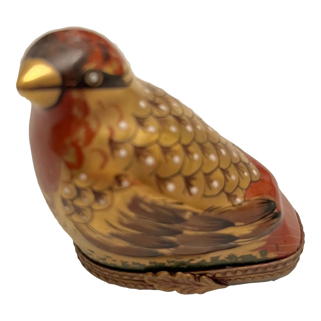 Early 20th Century Golden Bird Limoges Trinket Box: Beautiful hand painted golden bird with a leaf clasp. Peint Main PV Condition: Original Condition Unaltered; Some Imperfections; Appears to be in very good condition. May have slight wearing in red pa