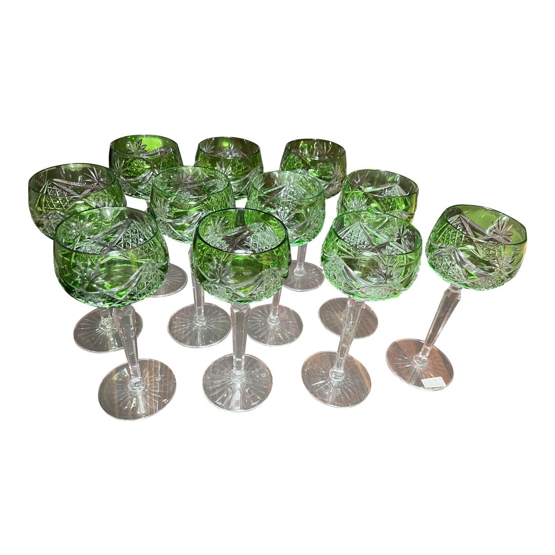 Vintage Val St Lambert Green Cut to Clear Crystal Hock Wine Glasses- Set of 11: A stunning mid-century set of emerald green overlay luxurious lead crystal cut to clear art glass Eleven gorgeous green cased glass cut to clear crystal wine hock glasses, rising on substantial sized