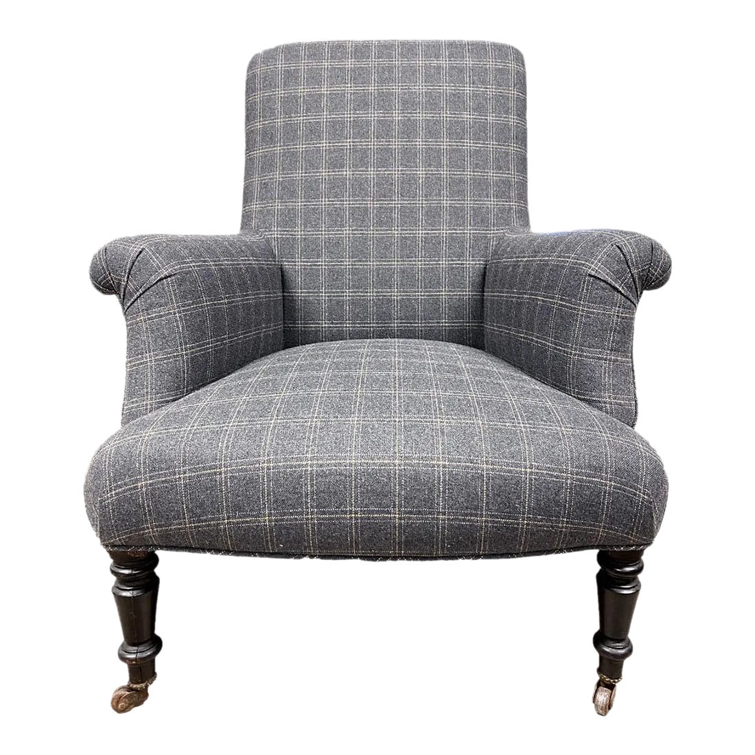 Early 19th Century Napoleon Chair: Original French Napoleon III chair. Newly reupholstered plaid wool fabric. New springs and stuffing as well. Condition: Original Design Modified; Some Imperfections; Legs and casters show minor wear f