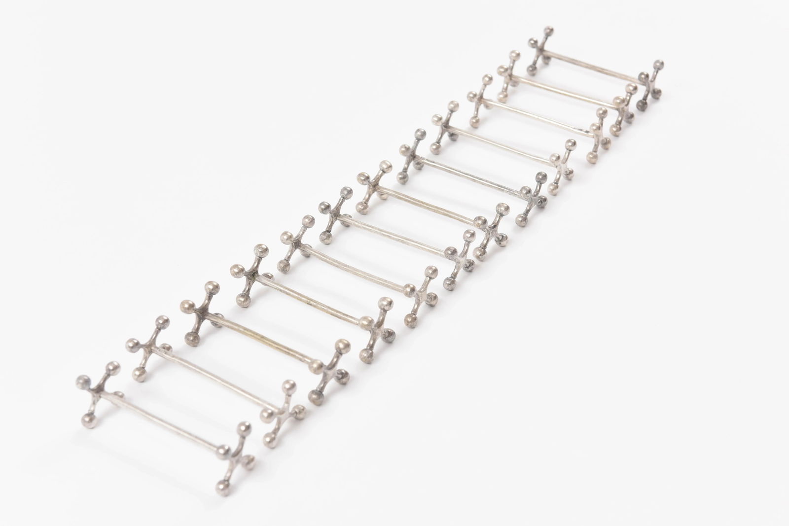 11 Christofle Knive Rests, Silver Plated Hand Chased Details - 6