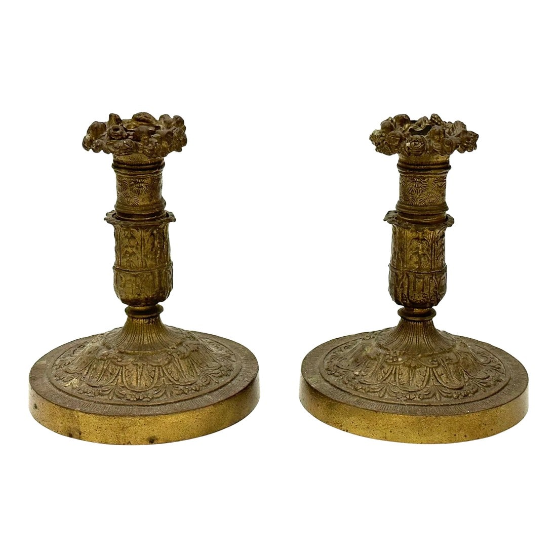 Pair of Late 19th Century French Empire Neoclassical Bronze Candlesticks: This pair of heavy bronze candlesticks have a nice overall patina and excellent design detail. Condition: Original Condition Unaltered; Some Imperfections; Both candlesticks are fee from breaks, crack