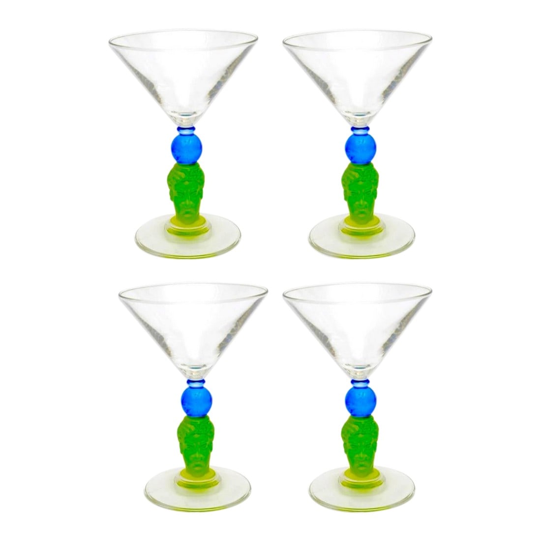 1990s Richard Jolley Signed Martini Glasses- Set of 4: This set of four marti glasses and each signed on the base€œRichard Jolley 1996." They are a unique set with a green human head and blue world globe holding the cup of the clear glass. 