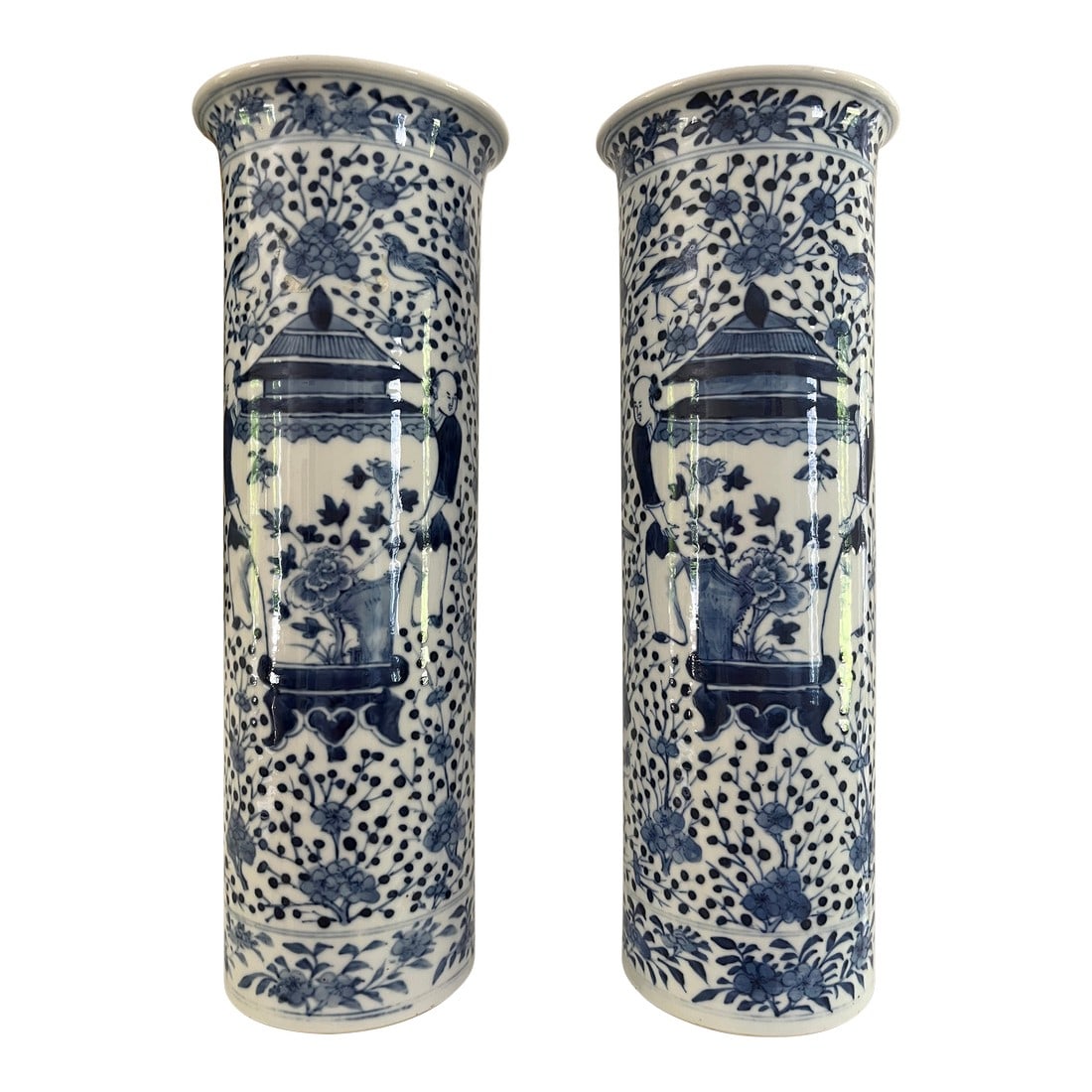 18th-Century Qing Chinese Blue and White Porcelain Cylinder Vases, a Pair: Pair of tImeless Chinese vases with a cylindrical shape that adds modernity to traditional blue and white porcelain. With a touch of ancient meta, the primary scene depicts two men setting down large