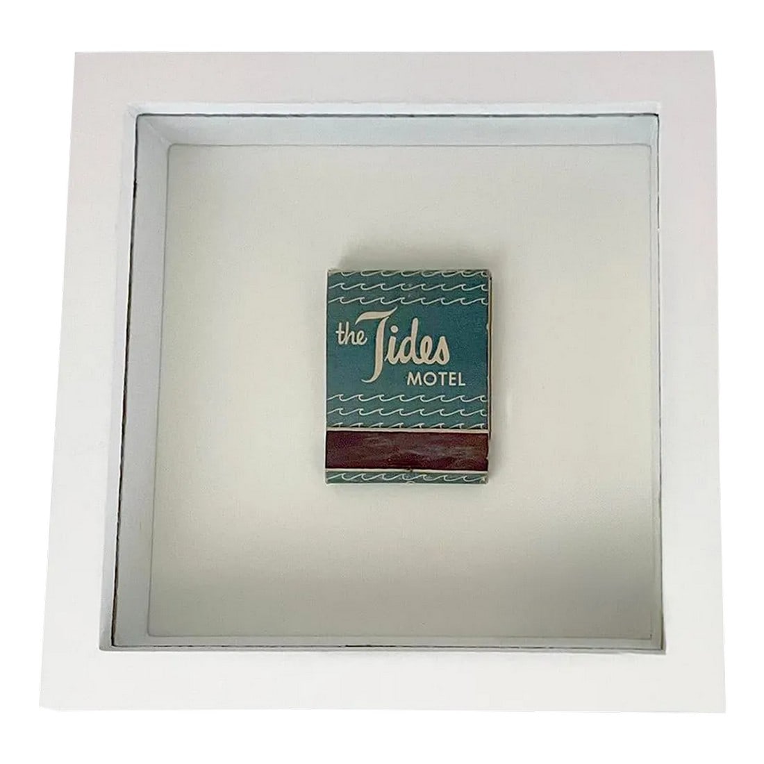 Mid 20th Century Mid Century Tides Motel of Laguna Beach Framed Vintage Matchbook: Vintage Tides Motel of Laguna Beach California matchbook. 3 dimensional matchbook is mounted inside a white shadowbox frame with glass. From the collection of Edward J. Maleski. Frame will stand on