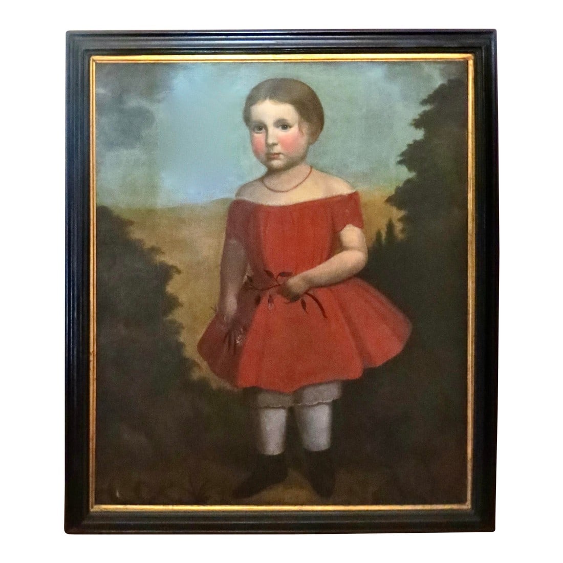 Folk Art Portrait Painting "Young Girl in a Red Dress", American, Circa 1825: Lovely full length portrait of a young girl in this folk art painting; oil on canvas mounted on board. She is posing wearing an attractive and colorful red dress while holding a floral branch in each