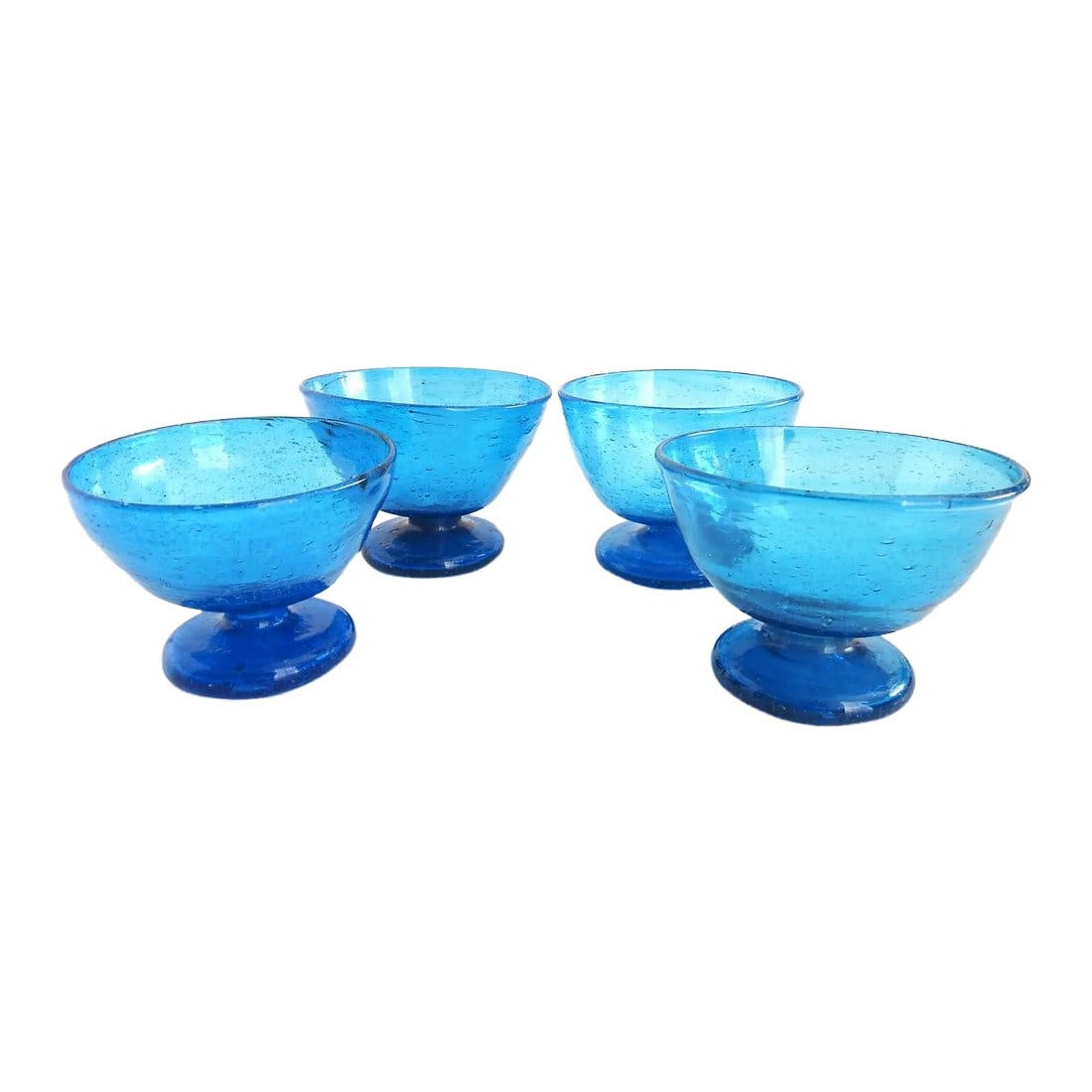 Cobalt Blue Recycled Hand Blown Glass Pedestal Ice Cream Sherbet Bowls- Set of 4: Beautiful mouth-blown bubbled recycled glass pedestal bowls for ice cream, jam, or sherbet. Pontil mark. No cracks, no chipping. There is residue inside the glass. 4" in diameter, 3" high. Excellent c
