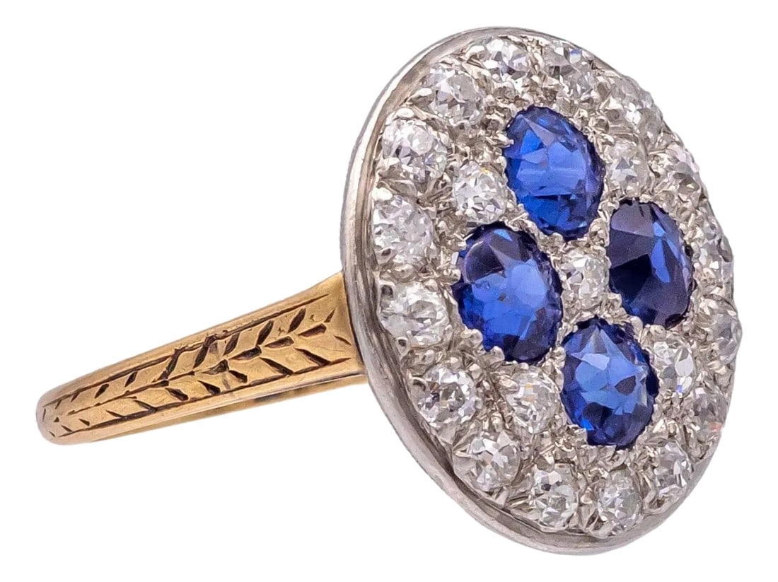 Antique 1900's Old Mine Diamond and Sapphire Platinum + 14k Yellow Gold Ring: This antique ring, handcrafted in Platinum and 14K yellow gold, features exceptional deep blue sapphires and old mine-cut diamonds in a low-profile setting designed for both comfort and style. The