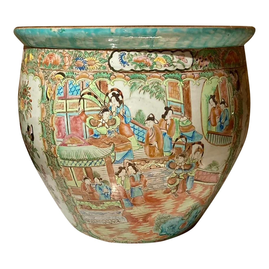 Antique Canton Famille Rose Planter: Large famille rose porcelain Canton planter. The decoration consists of two identical scenes repeated intermittently. One of the scenes depicts floral elements with peonies, long tailed birds and butt