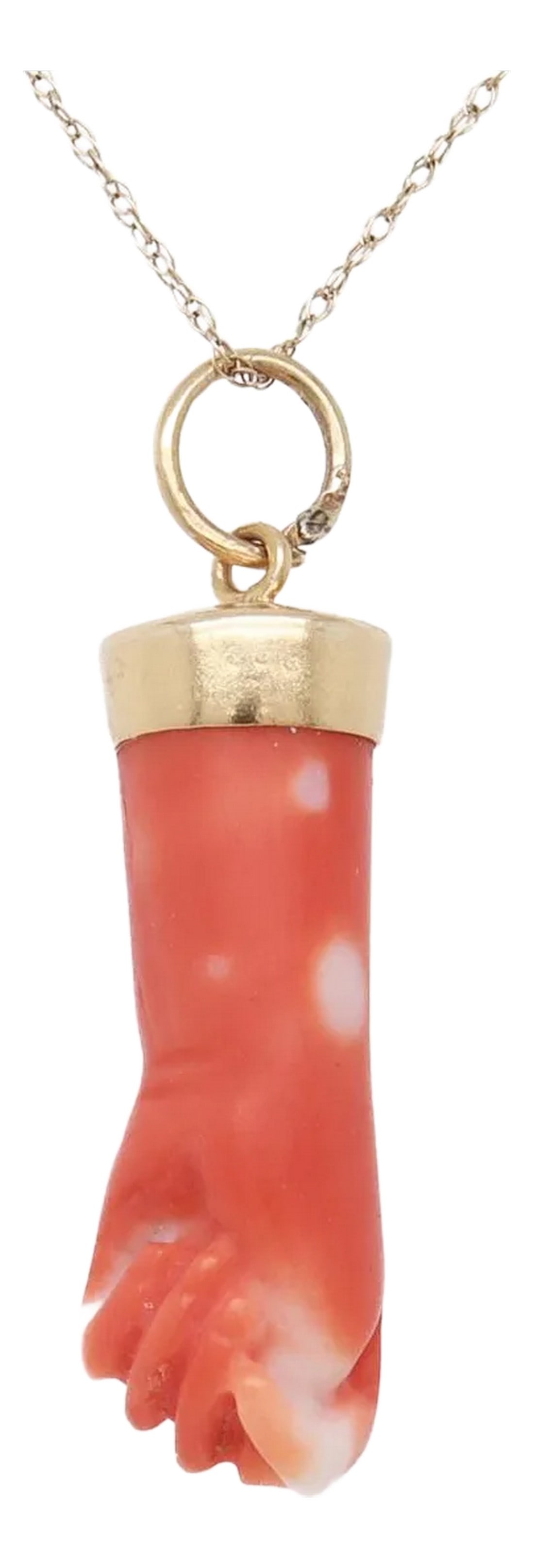 14k Gold & Coral Victorian Style Figural Hand / Fist Pendant or Charm: A fine Victorian style carved pendant or charm. In 14 karat yellow gold. In the form of a clasped hand in coral bezel-set in a gold mount. There is a treasure trove of Symbology related to the