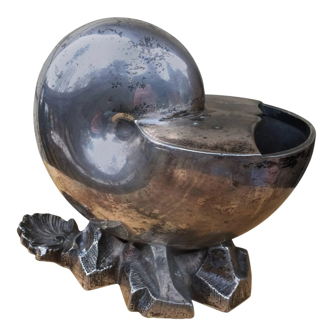 English Silver Plated Nautilus Shell Spoon Warmer: English Victorian silver plated spoon warmer in the form of a nautilus shell. Fine casting with the shell resting on a bed of rocks with a scallop form handle. Makers mark and EPBM. Whether used for i