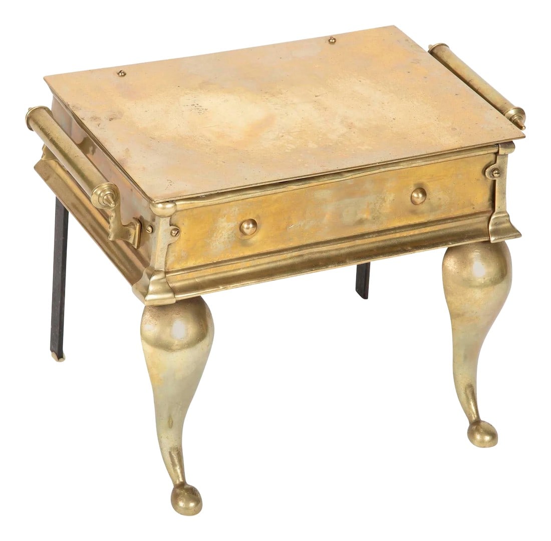 19th Century English Regency Brass Footman Stool or Side Table: 19th century English Regency brass footman, or fireplace trivet, makes a wonderful and unusual drinks or side table. With cabriole legs and handsome detailing on the corners and handles. Circa 1825. M