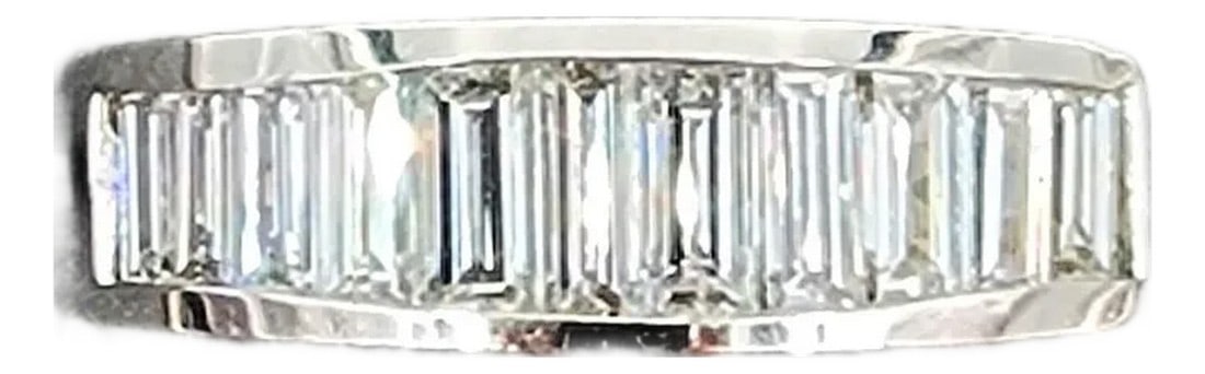 1.10 Ct Baguette Diamond Band Size 6.5: This elegant band ring is crafted from 14k white gold and features approximately 1.10 carats of baguette-cut diamonds. The diamonds are white, with a clarity of VS1/VS2 and a color grade of G/H.