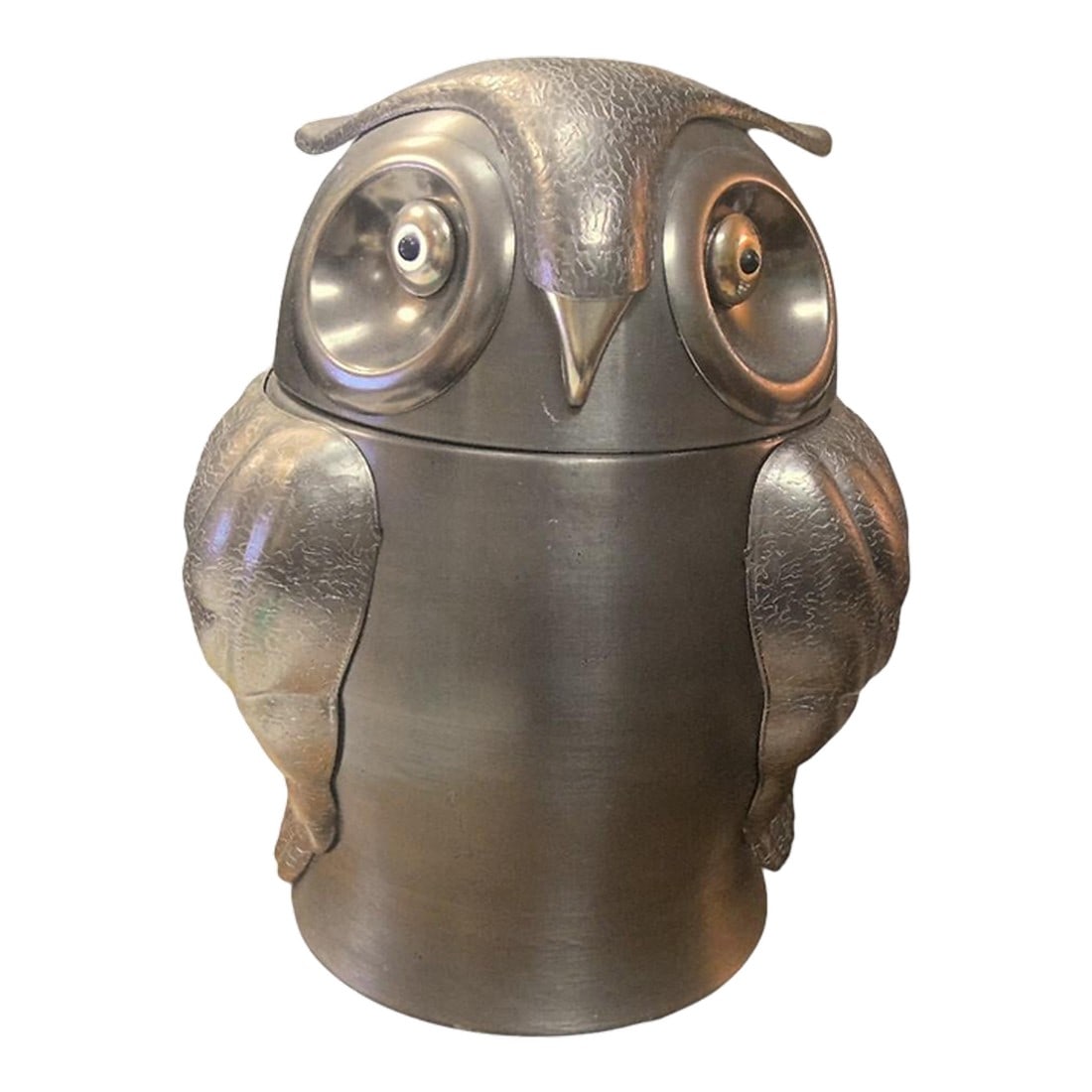 Mid 20th Century Vintage Pewter Ice Bucket: A charming vintage owl-shaped ice bucket made of pewter. This piece features intricate detailing, capturing the texture of feathers and the expressive eyes of an owl. Its unique design makes it both a