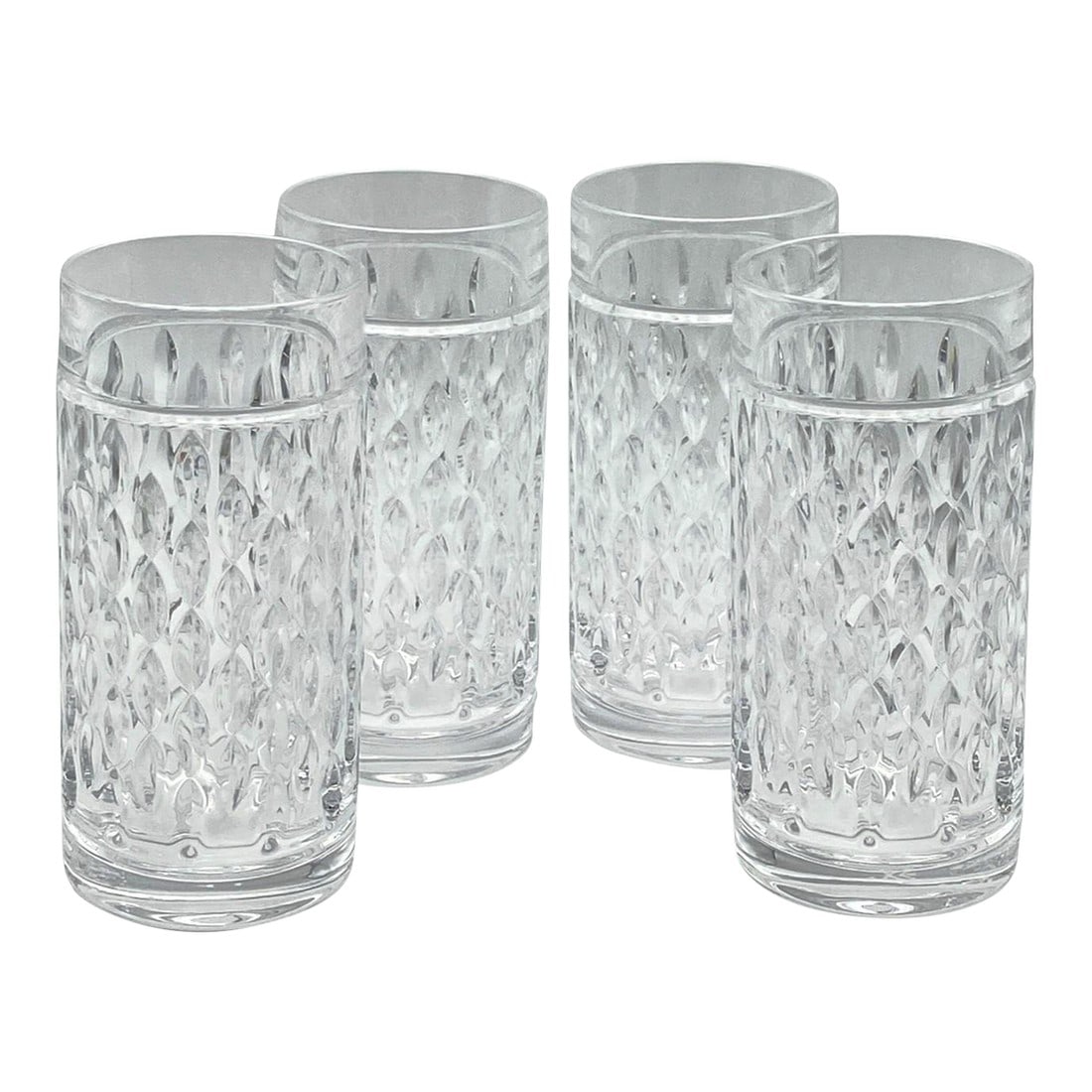 Ralph Lauren Aston Crystal Highball Glasses - Set of 4: A set of four heavy crystal highball glasses. These are part of the Aston collection by Lauren Ralph Lauren Crystal, and crafted in Germany from lead crystal in a distinctive cut teardrop pattern. Exc