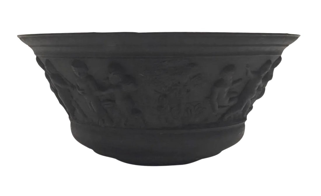 19th-Century Grand Tour Bronze Bowl: A round Grand Tour 19th-Century bowl or basin embellished with cherubs and satyrs. Wear is consistent with age; patina show signs of wear, one small dign in the rim. Condition: Original Condition Unal