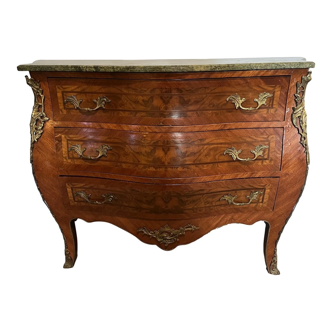 Early 20th Century Louis XV Style Inlaid Mahogany Commode: A Louis XV style gilt bronze mounted inlaid burl walnut and mahogany commode, early 20th century, of bombe and serpentine form, surmounted by a marble top, which is removeable. Fitted with three drawe