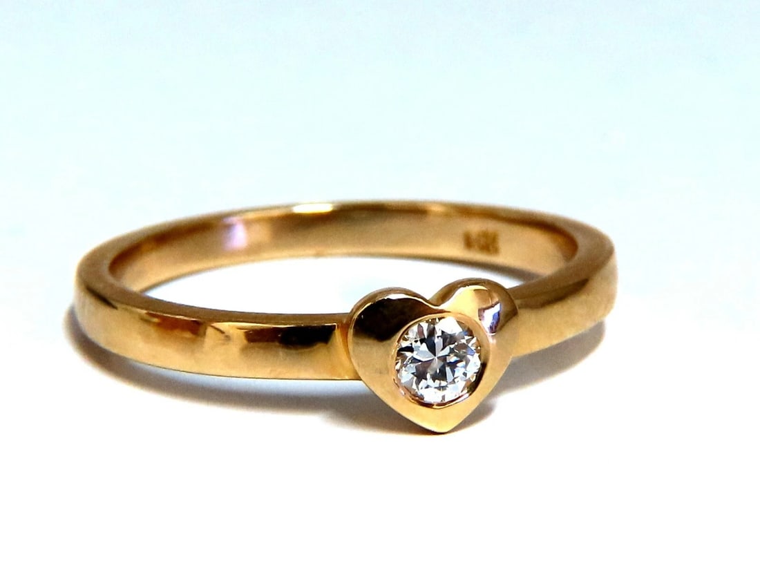 .12ct Natural Round Diamond Heart solitaire Petite Ring 14kt: Title: .12ct Natural Round Diamond Heart solitaire Petite Ring 14kt Description: Petite Heart Solitaire .12ct Natural Round Cut Diamond Heart Ring Vs-2 clarity I color. 14kt yellow gold 2.5 Grams Over