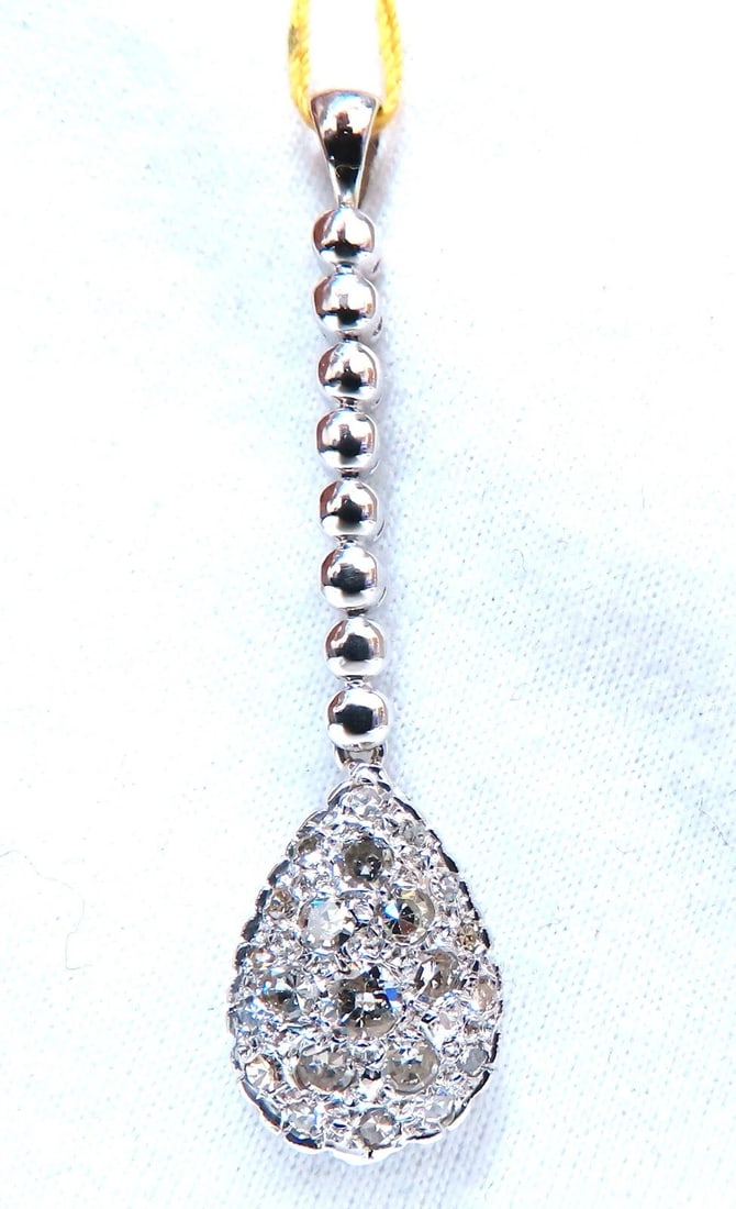 .50ct Natural Pear Diamonds Drop Pendant 14kt Dangle**: Title: .50ct Natural Pear Diamonds Drop Pendant 14kt Dangle** Description: Gorgeous Pear Dangle Cluster Drop Pendant. .50ct Natural Round Diamonds. H-color Vs2 Si-1 clarity. 14kt white Gold 3.2 Grams