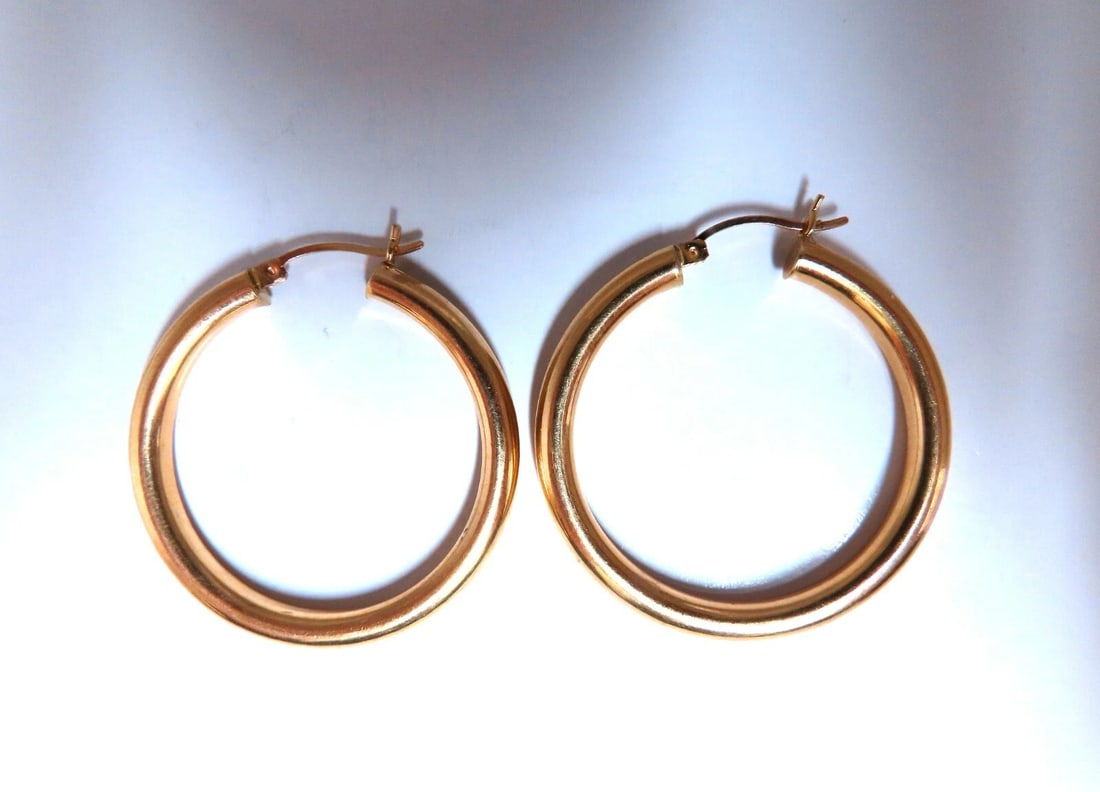 14Kt Gold Hoop Earrings Tubular Plain 1.46 inch diameter**: Title: 14Kt Gold Hoop Earrings Tubular Plain 1.46 inch diameter** Description: Gold Hoop Earrings Measurements of Earrings: 37mm diameter / 1.46 inch 4mm wide. 4.8 grams / 14kt. yellow gold Earrings a