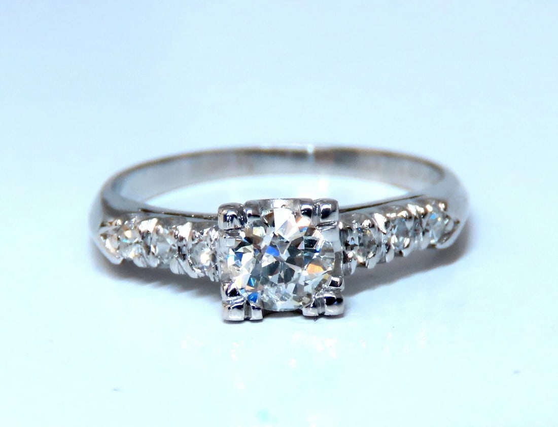 .66ct Natural Diamonds Cathedral Ring Platinum Vintage Restored: Title: .66ct Natural Diamonds Cathedral Ring Platinum Vintage Restored Description: Round Raised Cathedral .50ct. Round natural diamond Ring I-color, Si-1 clarity 4.8mm diameter .16ct round diamonds: