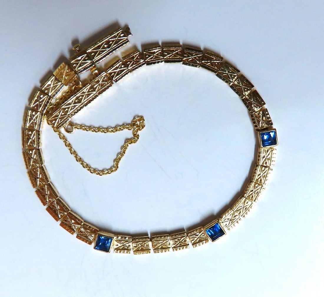 .76 carat natural princess cut sapphire square box bracelet 14kt gold**: Title: .76 carat natural princess cut sapphire square box bracelet 14kt gold** Description: .76 carat natural princess cut sapphires link bracelet. Sapphires measures 3 x 3 mm each clean clarity trans