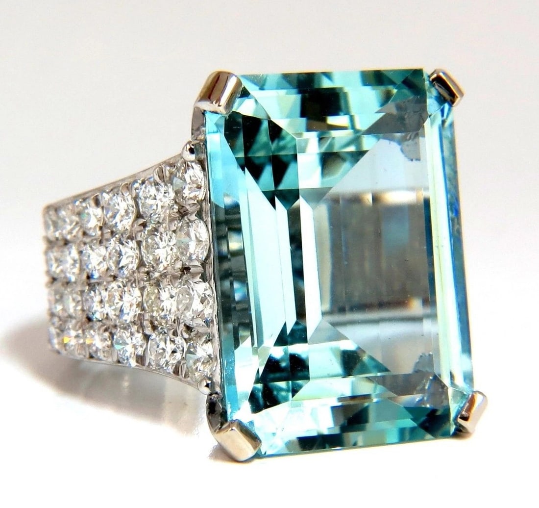 GIA Certified 28.26ct Natural Aquamarine diamonds ring Vivid 14kt: Title: GIA Certified 28.26ct Natural Aquamarine diamonds ring Vivid 14kt Description: Aquamarine Collections GIA Certified 25.12ct. Natural Aquamarine Ring Excellent clean clarity Octagonal Step cut