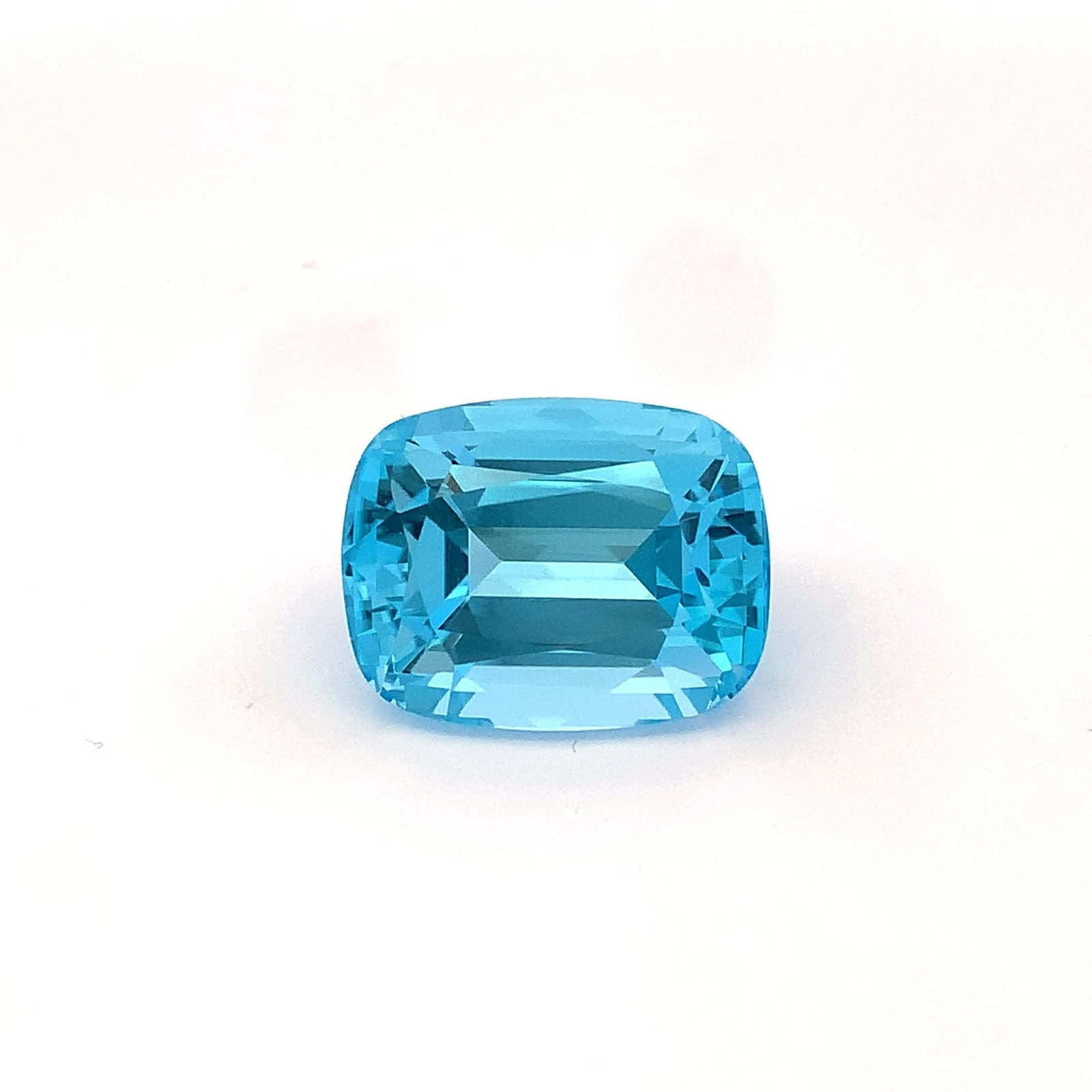 40.15 Carat Swiss Blue Topaz Cushion Cut Loose Gemstone For Jewellery: Title: 40.15 Carat Swiss Blue Topaz Cushion Cut Loose Gemstone For Jewellery Description: Introducing a magnificent Swiss Blue Topaz gemstone. Its fancy cushion Cut, which sparkles wonderfully, stands