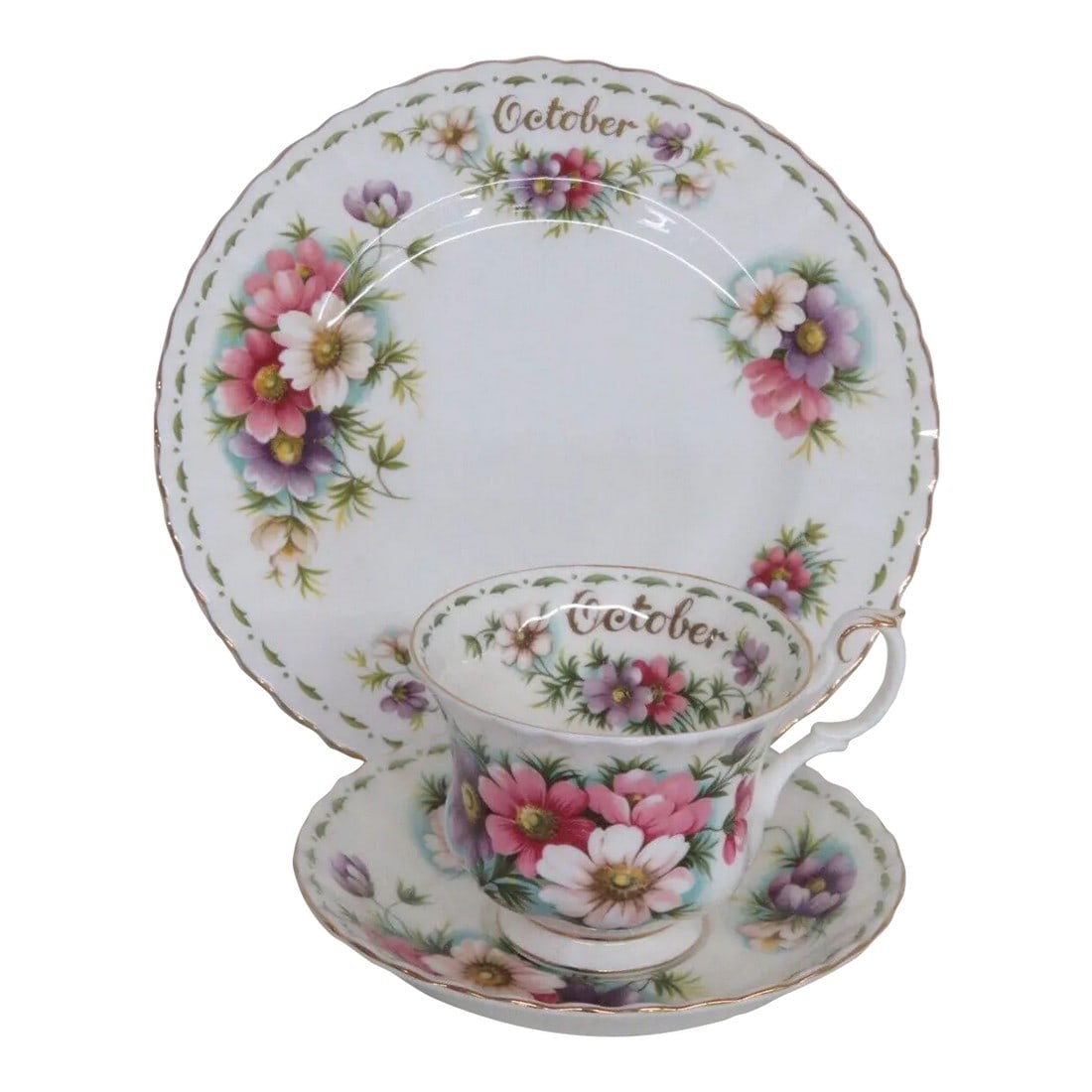 Royal Albert Bone China October Cosmo Flowers Tea Cup Saucer and Plate Set: This lovely tea cup, saucer, and dessert plate set is made of bone china. This set is stamped as being made by Royal Albert in England, see pictures, and this set is part of the Flowers of the Month