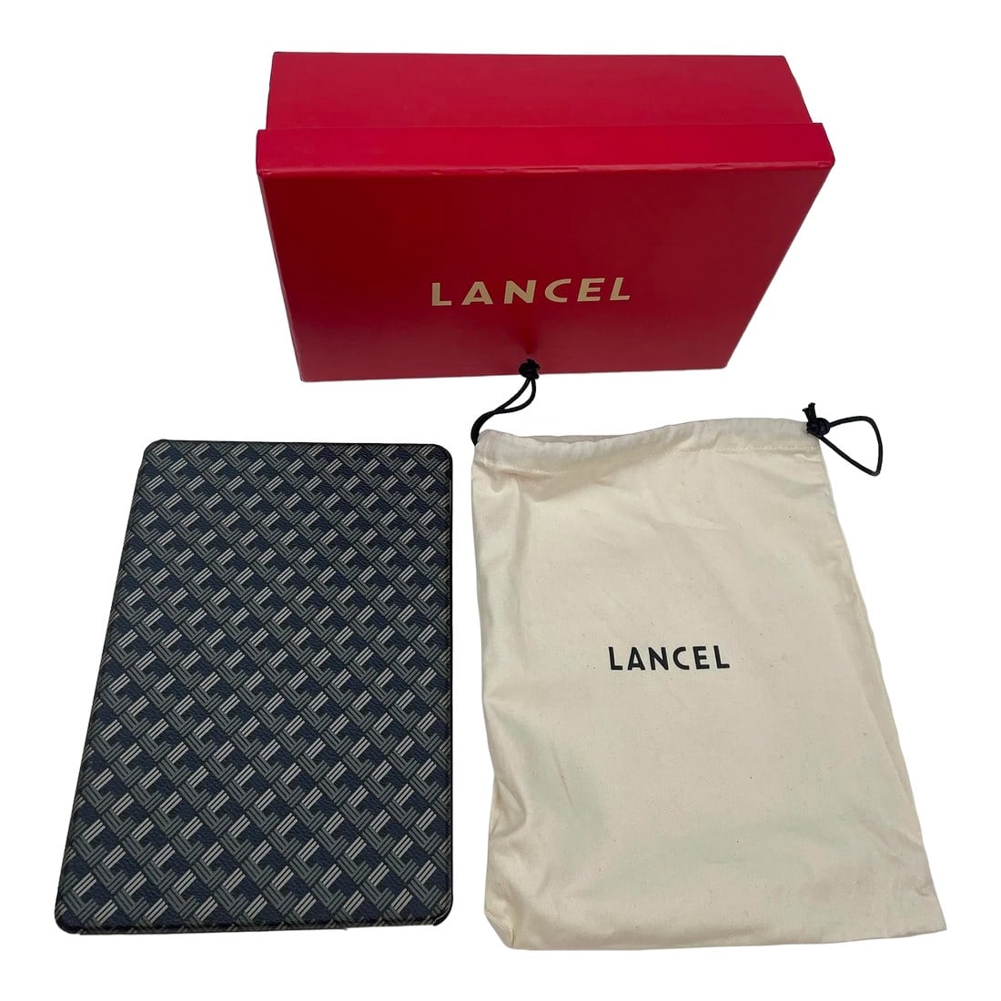 Maison Lancel Mini iPad Case: LANCEL with all-over logo print mini iPad case and stand. For mini IPad, case by Lancel France. Blue and white canvas leather. Lancel monogram logo throughout Snap front and back closure Flip front