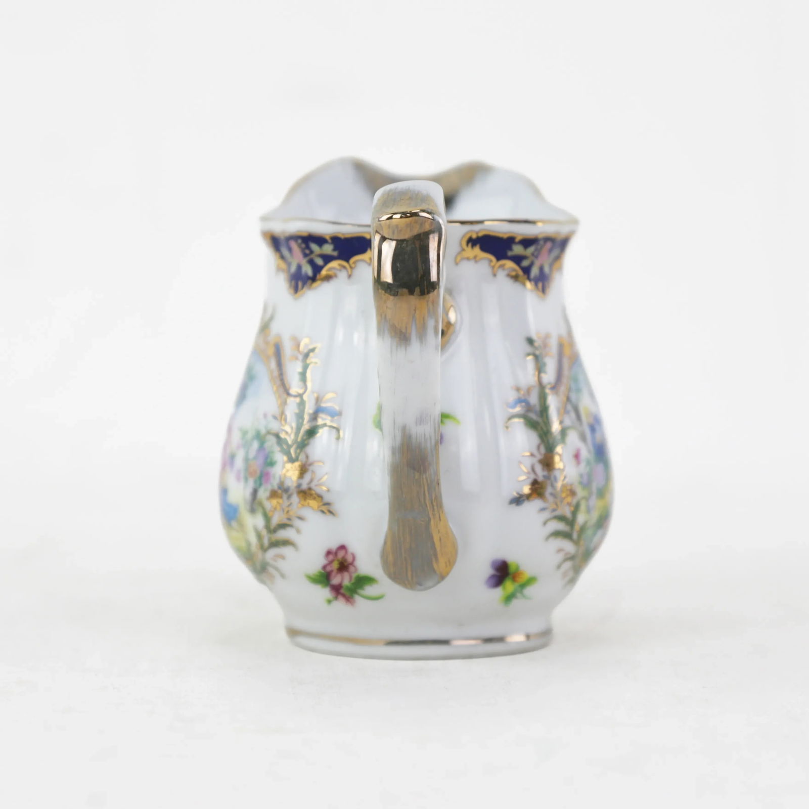 Elegant Victorian Porcelain Creamer With Ornate Blue and Gold Floral Design - 4