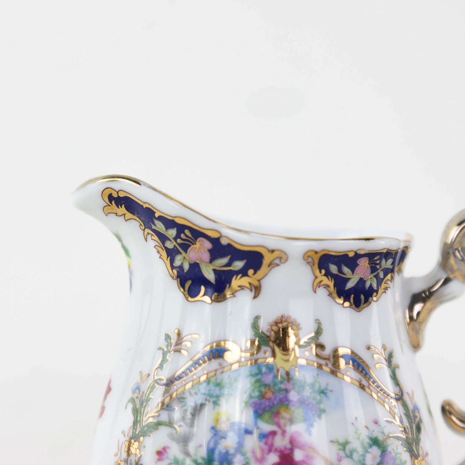 Elegant Victorian Porcelain Creamer With Ornate Blue and Gold Floral Design - 7