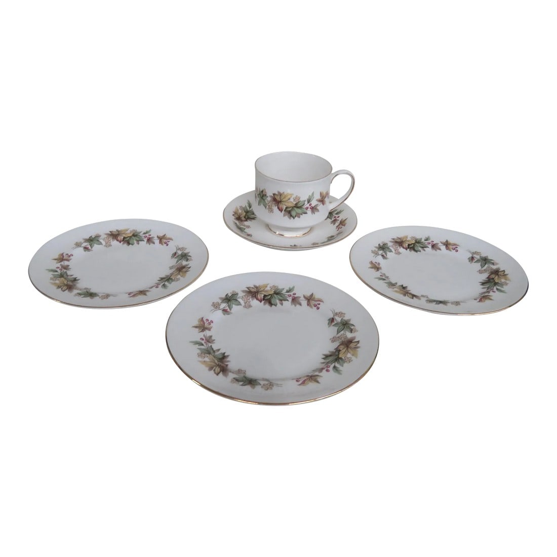 Royal Standard Lyndale England Tea Cup Saucer and 3 Dessert Plates: This lovely Set of Tea Cup, Saucer and 3 Tea Plates is made of bone china. This set is stamped as being made by Royal Standard in England, Lyndale line. This set has a gorgeous white color with a