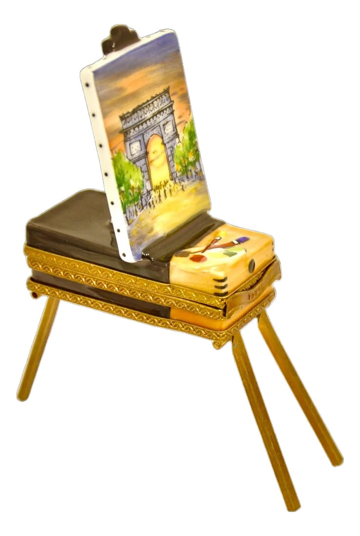 Limoges Painter's Easel Accent Box: Vintage Limoges of France accent trinket box designed as a street painter's colorful mobile easel with Arc de Triomphe intricately hand painted blue, gray, purple, yellow, green and brown with a