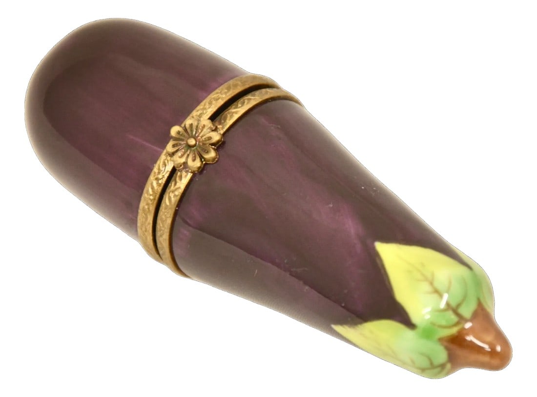 Limoges Purple Eggplant Accent Box: Vintage Limoges of France trinket accent box designed as a deep purple eggplant with chartreuse green leaves and brown stem as well as a gold metal flower closure. Maker's mark on interior. Light