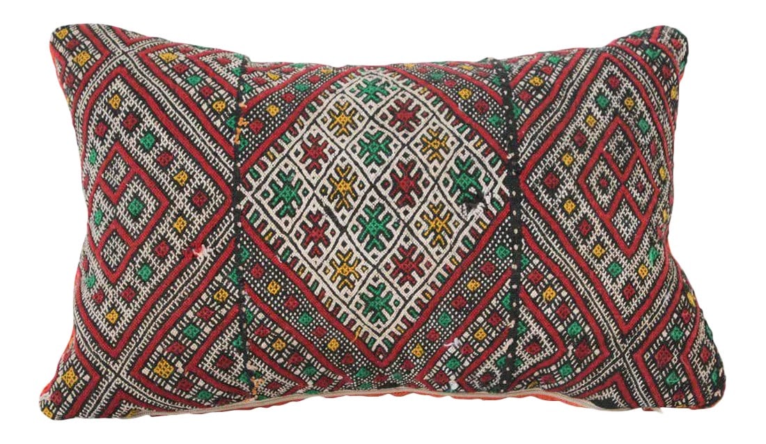 Moroccan African Tribal Throw Kilim Pillow: Moroccan Berber handwoven tribal throw pillow made from a vintage rug. The front and the back are made from a different rug, front is more elaborate and back is more plain. Geometric African tribal de