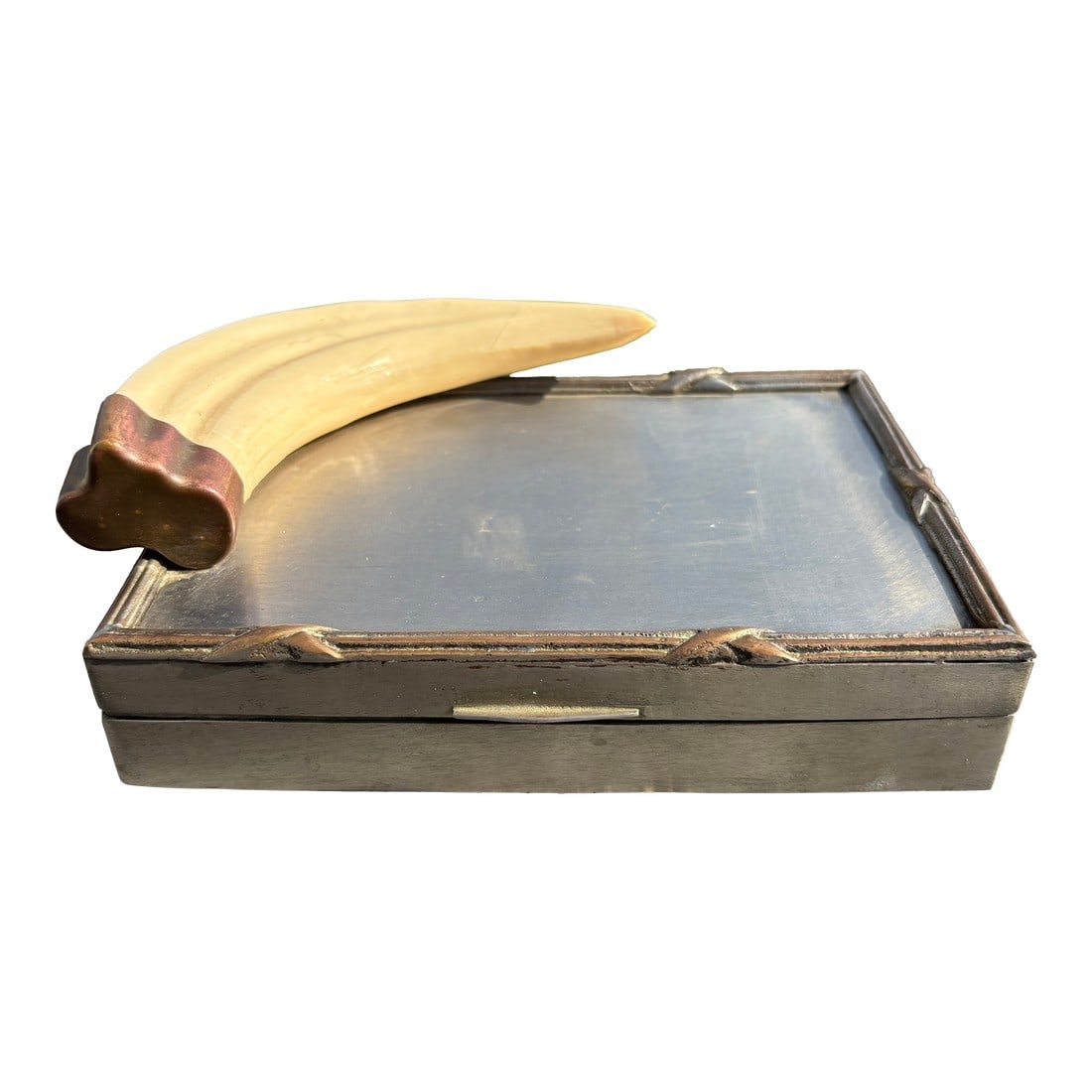 Mid 20th Century Faux Tusk Box: For the Mighty Hunter! Beautifully detailed and finely crafted Mid-Century Desk Box. Hard-formed metal with heavy hinged lid and a blue velvet interior lining. Large Faux tusk ornament on the