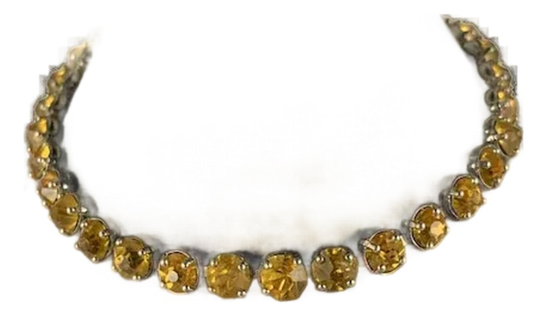 1920s Art Deco Sterling Line Bracelet with Paste Citrines: This beautiful Art Deco sterling and citrine paste line bracelet is perfect for every day. It goes with everything! It measures 7" long and is 3/8" wide. The stones have a wonderful shine to them. It