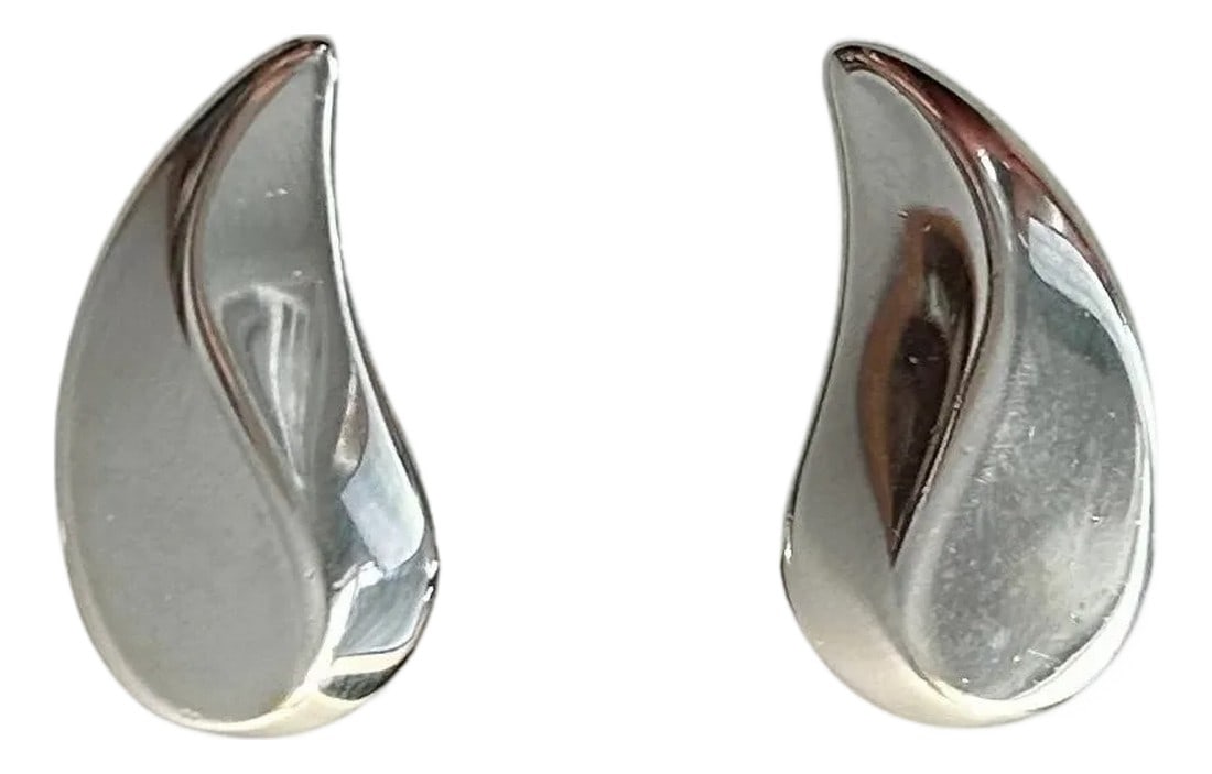 Vintage Monet Teardrop Clip-on Earrings "“ Polished Silver-Tone Sculptural Design, A Pair: Vintage Monet Teardrop Clip-On Earrings â€“ Polished Silver-Tone Sculptural Design These vintage Monet clip-on earrings feature a beautifully sculptural teardrop silhouette with a