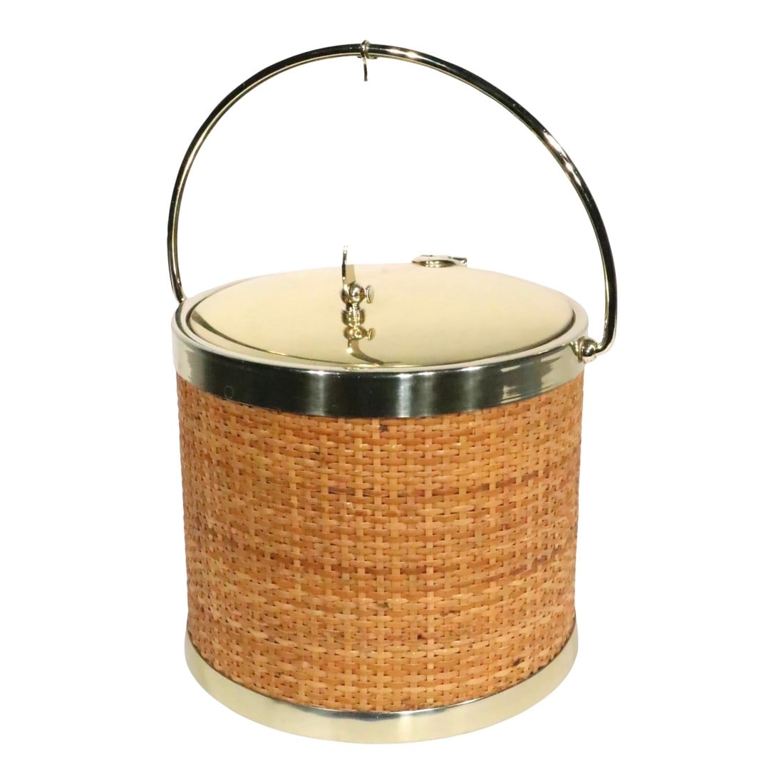 Mid Century Hollywood Regency Raffia Wrapped Brass Plated Ice Bucket by Kraftware New York C. 1970's: Chic and stylish Mid Century Hollywood Regency style ice bucket, having a raffia wrapped exterior, with a brass plated metal top, handle and trim. The interior id lined in white plastic. This