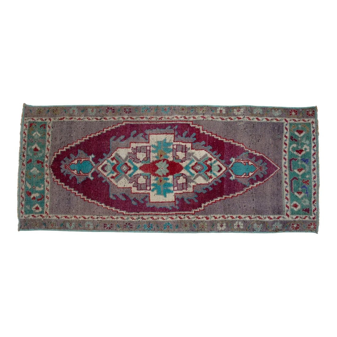 1970s Vintage Hand Knotted Small Rug: This vintage Oushak mat brings a sophisticated splash of Aegean color to your floor, featuring a beautifully sun-faded palette that whispers of coastal Turkish charm. Its low-pile texture and intricat