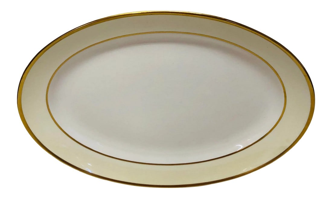 Large Pope Gosser Cream, Ivory and Gold Ivanhoe Platter, Marked Ivanhoe Usa: 15.5" Ivanhoe platter by Pope Gosser. Has crazing but no chips or cracks. Very minor wear to gold. Condition: Alterations: Original Condition Unaltered Imperfections: Some Imperfections Condition