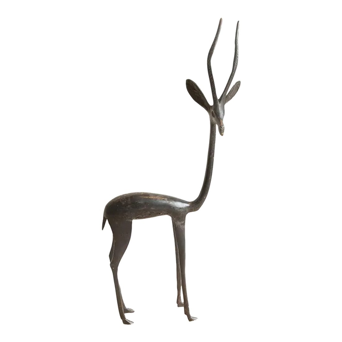 Medium Vintage African Gazelle Sculpture: Medium vintage African gazelle sculpture. As this item is in vintage condition, it may show signs of age and use. Date made estimated to be 1960's. Approximate size measures: 1.5" x 5.5" x 13.5". Cond