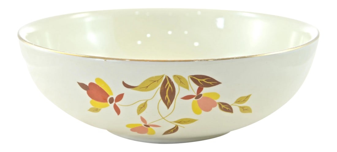 Round Leaf & Vine Bowl: Large vintage round bowl with a gold rim and yellow, red, and brown leaf vine pattern. Maker's mark on underside. Light wear. Condition: Alterations: Original Condition Unaltered Imperfections: