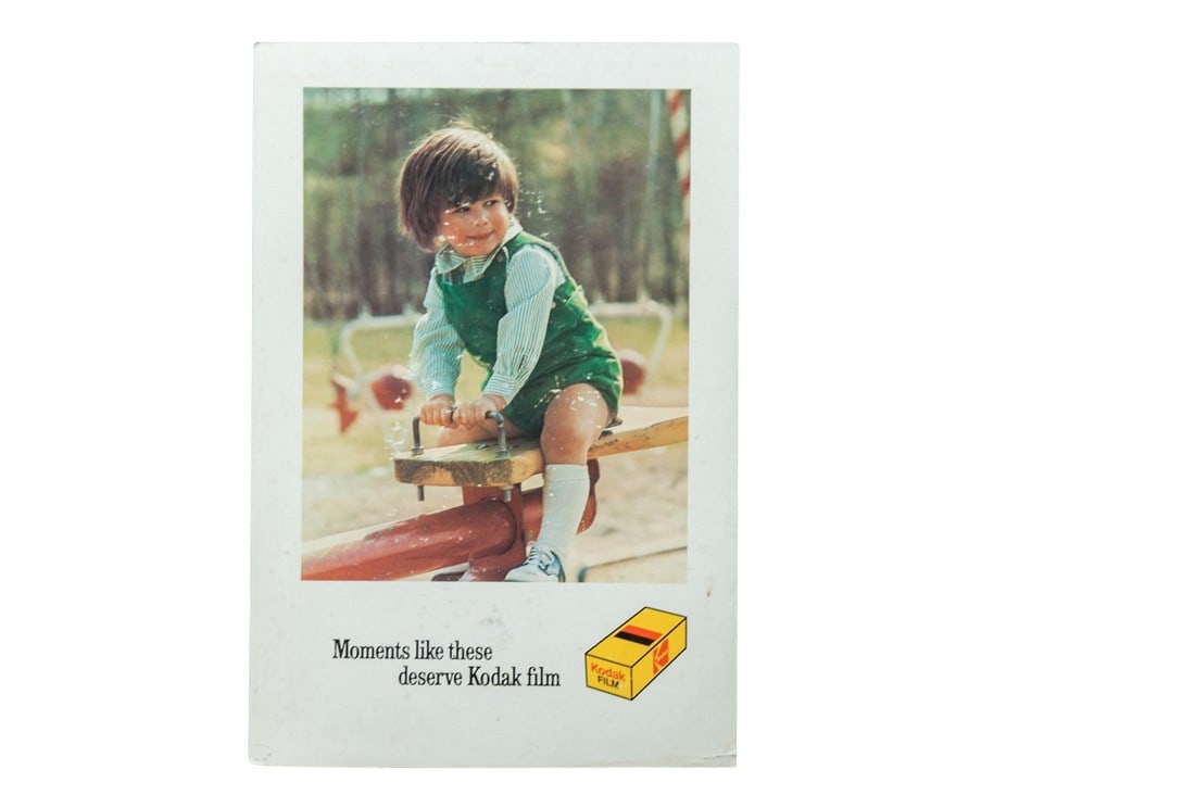 Moments Like These Kodak Print: Take a trip back in time with this classic Kodak film advertisement. From Kodak's "Moments like these deserve Kodak film" series of advertisements, this was most likely meant for use in a local film s